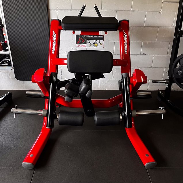 Plate-Loaded Kneeling Leg Curl - targets Legs